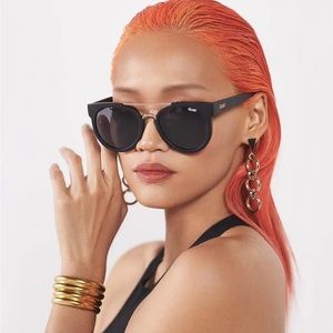 Quay Odin Sunglasses. Matte black frame with smoke lenses.